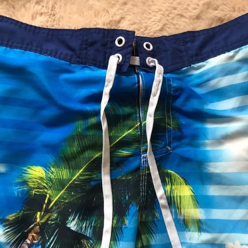 Corona bright color palm tree men’s swim trunks